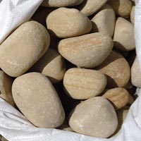 Manufacturers Exporters and Wholesale Suppliers of Teak Stone Pebbles Jaipur Rajasthan